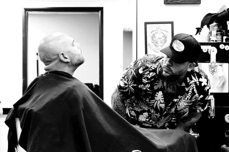 Barber Rob cutting a client's hair at Monty's Barber Shop